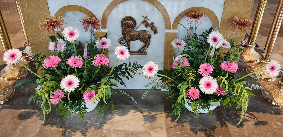 Pink-centered Gerbera Daisies,  Spider Mums, Veronica, Green Amaranthus, Leatherleaf Fern, &  Baby Blue Eucalyptus